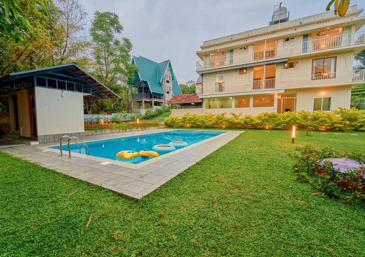 Glen Castle Vagamon Pool Resort By Voye Homes Bagian luar foto